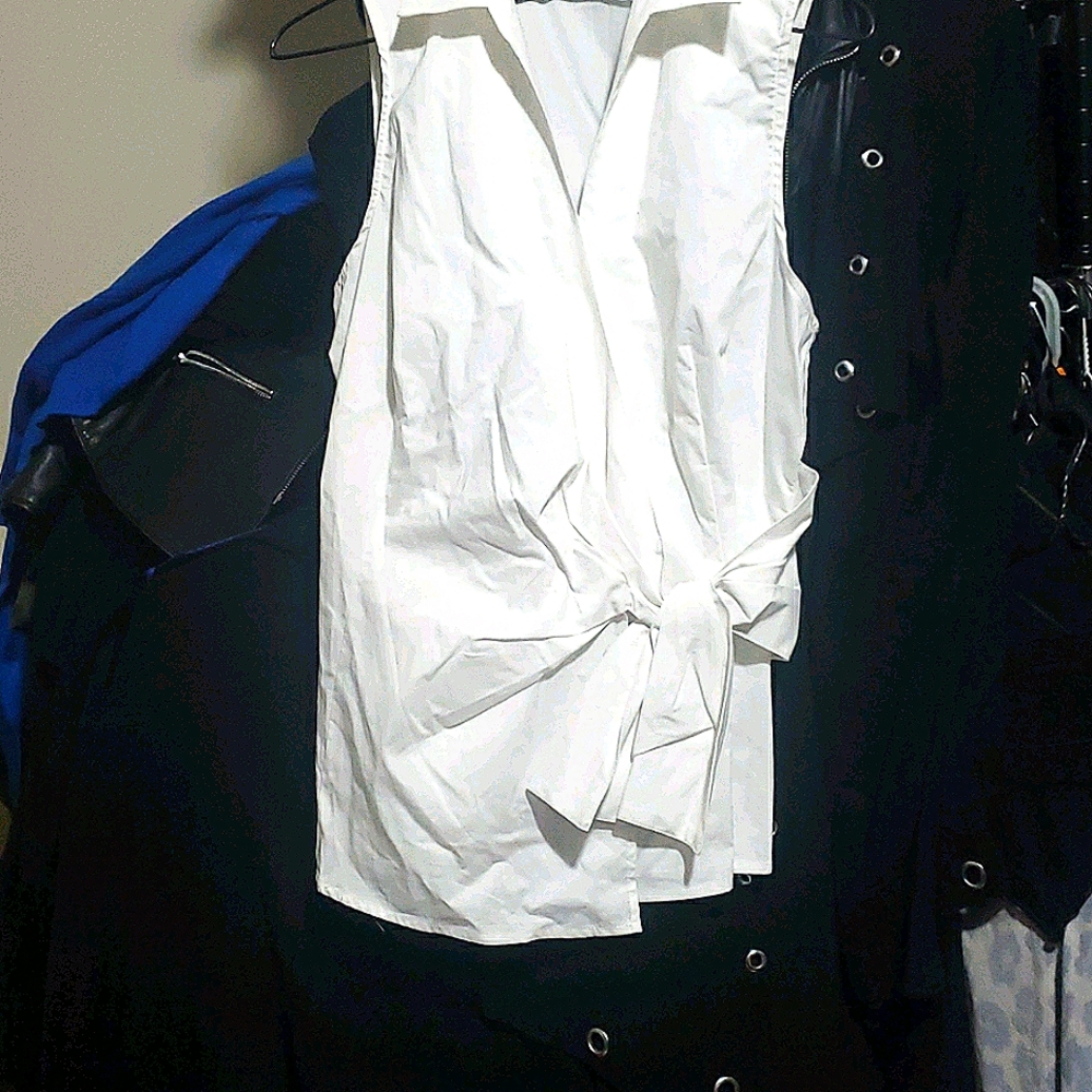 White sleeveless tie front blouse with side zip